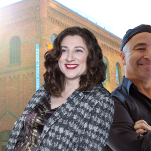 Snow White Director Aurora Browne and YPT Artistic Diretor Herbie Barnes stand back to back, smiling towards the camera. Their images are superimposed over a picture of YPT's large, brick playhouse, which is hung with pale blue banners emblazoned with the YPT logo.
