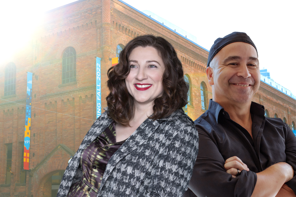 Snow White Director Aurora Browne and YPT Artistic Diretor Herbie Barnes stand back to back, smiling towards the camera. Their images are superimposed over a picture of YPT's large, brick playhouse, which is hung with pale blue banners emblazoned with the YPT logo.