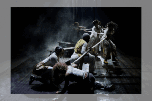 Members of the company in 'Ransacking Troy.'