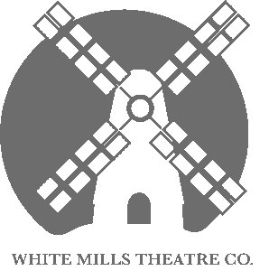 A white windmill with an open door sits atop a hill. 