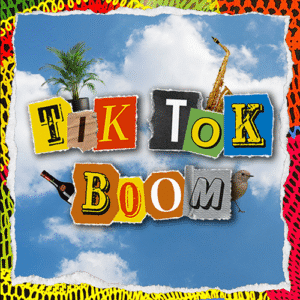 The image features a playful, collage-style design set against a bright blue sky with soft white clouds. Around the edges is a colorful, scribble-like border in red, yellow, green, and black. In the center, the words “Tik Tok Boom” are spelled out using cutout-style letters that look like they were clipped from different magazines or materials, each with a unique color and texture. Some letters appear on paper scraps, fabric, or wood-like backgrounds. Above and around the text are small objects: a potted palm plant near the top left, a golden saxophone near the top right, a wine bottle near the bottom left, and a small bird perched near the bottom right.